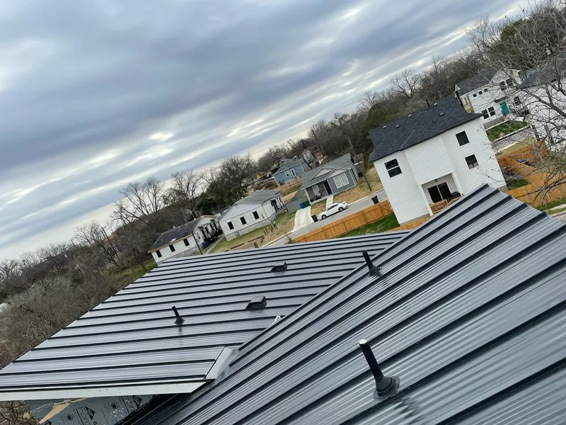 Standing seam metal roof panels with vents for Skylight Repair in Ecorse